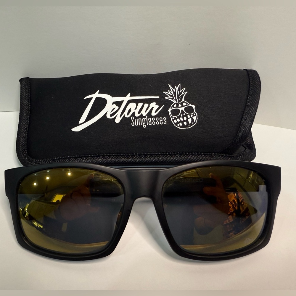 Black Sunglasses with Gold Lenses